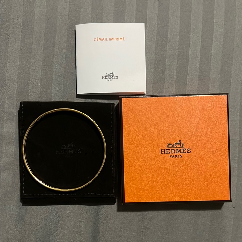 Hermès Gold Tone Bangle